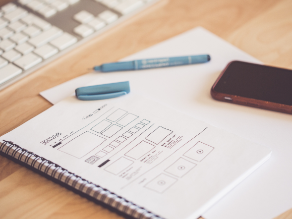 A global pharma leader - drawing of a workflow on a notebook